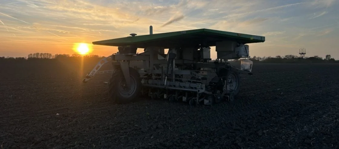 FarmDroid Robot at Sunrise